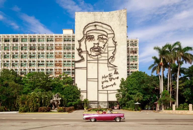 Plaza de la Revolución with Che Guevara mural and modern government building in Havana